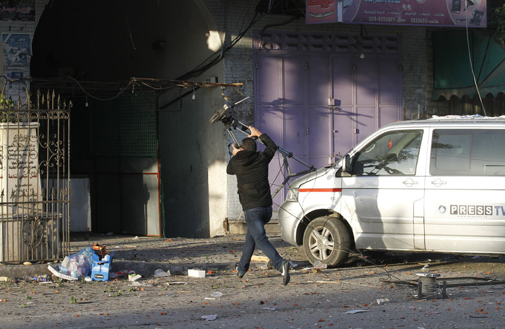 停火了 摄影师见证加沙炮火横飞的残酷